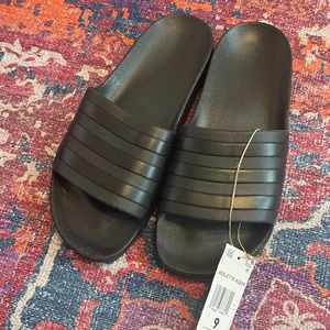 Black adidas slides